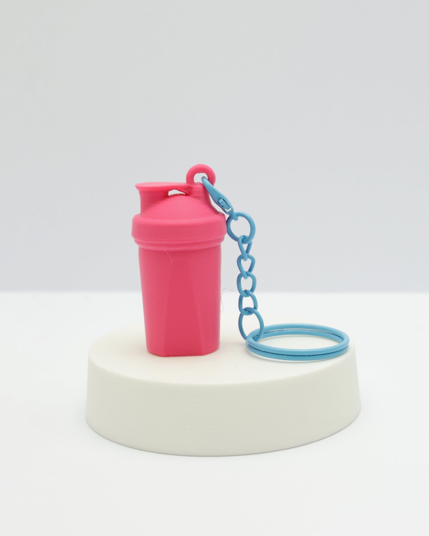 Llaveros Shaker Gimnasio Fucsia